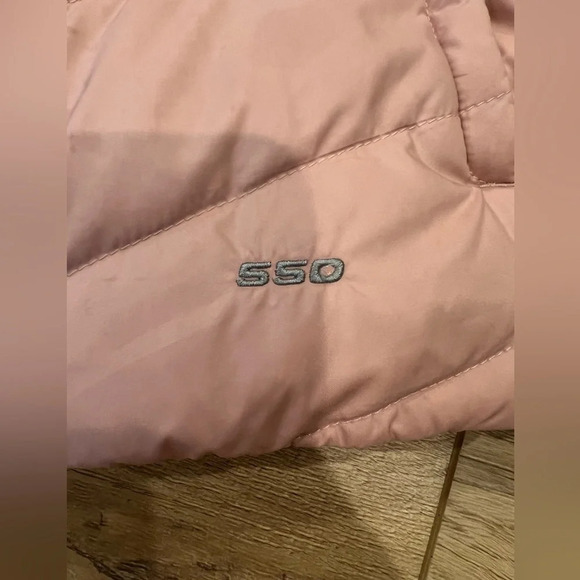 The north face 
Pink puffer vest 
Pilling on inside, Small stains on front - Picture 6 of 9